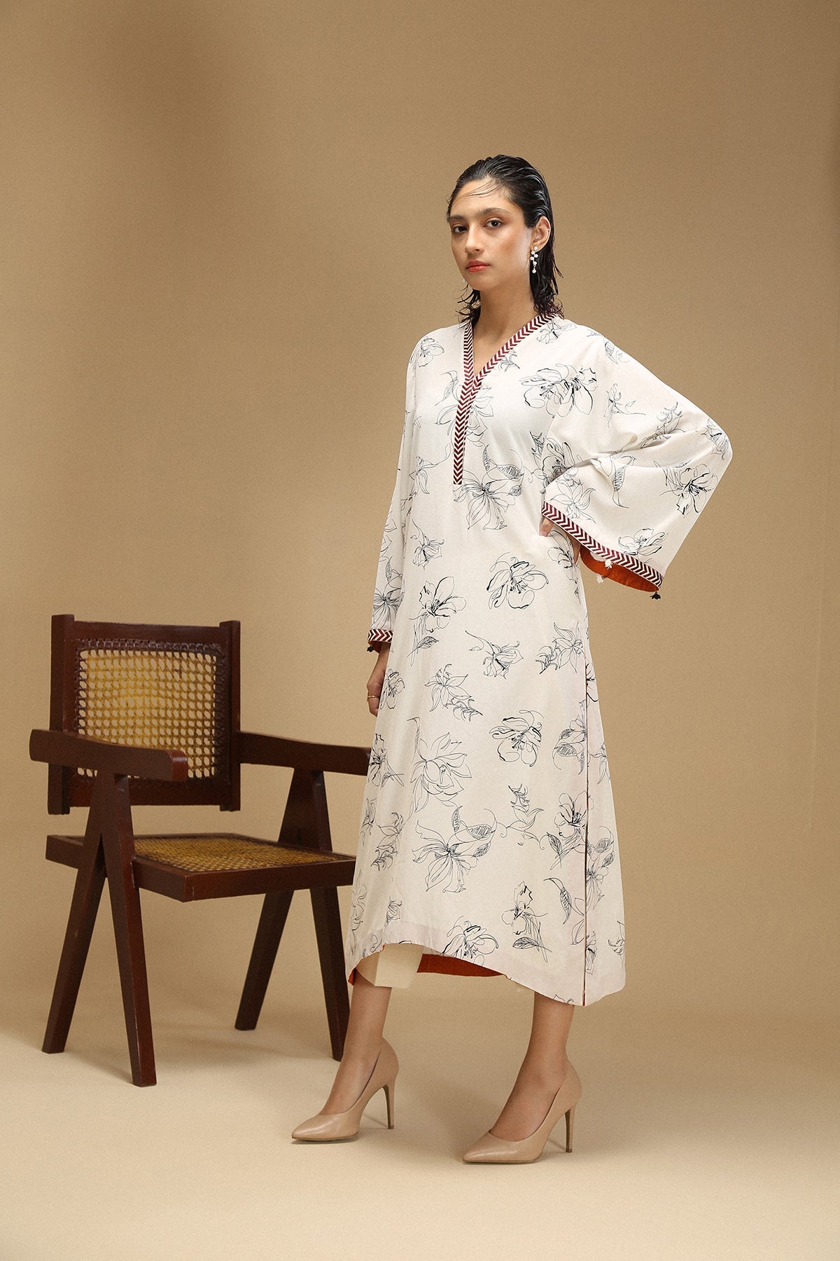 Printed shirt with embroidered neckline and sleeves