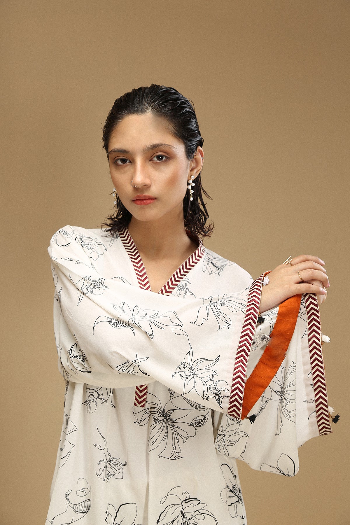 Printed shirt with embroidered neckline and sleeves