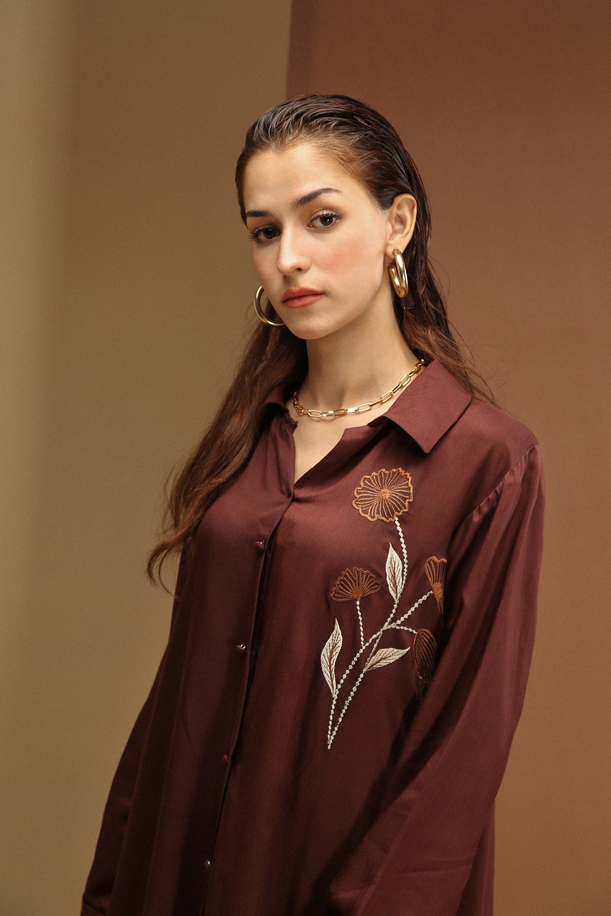 Long button down shirt with embroidered front and side loops