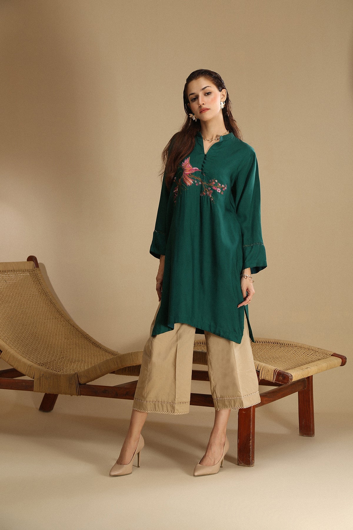 Mid length trendy shirt with embroidery on front